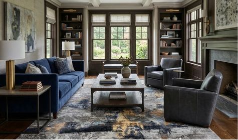 A beautifully styled, high-end American living room featuring a large handmade area rug